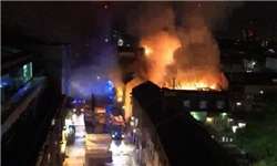 آتش‌سوزی گسترده در یک بازار لندن+ تصاویر